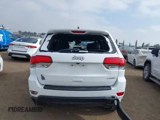 2020 Jeep Grand Cherokee Laredo E with VIN 1C4RJEAG4LC245884, listed as a IAAI auction lot 42564754 with 63,356 mi miles and . Bid and sale history available at DreamBid. Image 17.