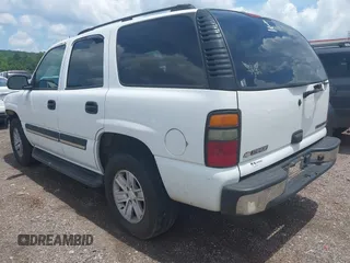 2005 Chevrolet Tahoe LS with VIN 1GNEC13V65R154250, listed as a IAAI auction lot 42633273 with 319,329 mi miles and . Bid and sale history available at DreamBid. Image 3.