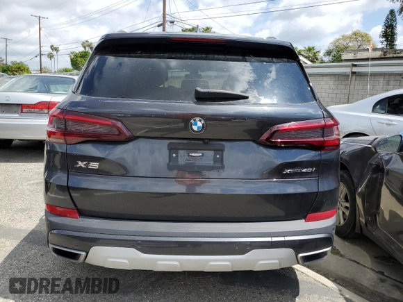2022 BMW X5 xDrive40i with VIN 5UXCR6C02N9N18226, listed as a Copart auction lot 50031523 with 13,907 mi miles. Bid and sale history available at carsss.com. Image 6.