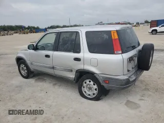 2000 Honda CR-V LX with VIN JHLRD2842YC011321, listed as a Copart auction lot 80714704 with 193,291 mi miles and Salvage Title. Bid and sale history available at carsss.com. Image 2.