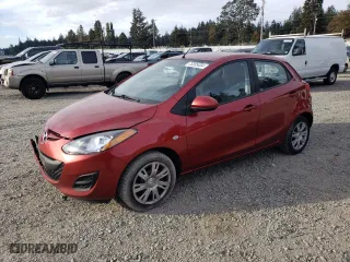 2014 Mazda Mazda2 Sport with VIN JM1DE1KZ9E0186729, listed as a Copart auction lot 73205454 with 123,050 mi miles and Salvage Title. Bid and sale history available at carsss.com. Image 1.