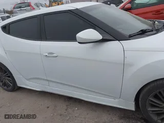 2013 Hyundai Veloster RE:MIX with VIN KMHTC6AD6DU135325, listed as a IAAI auction lot 41089948 with 238,459 mi miles. Bid and sale history available at carsss.com. Image 13.