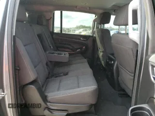 2020 Chevrolet Suburban LS z VIN 1GNSCGKC0LR178627, wystawiony jako Copart lot #75691803 z przebiegiem 60 978 mil mil oraz Szkoda całkowita • Salvage title. Historia ofert i sprzedaży dostępna na DreamBid. Obrazek 11.