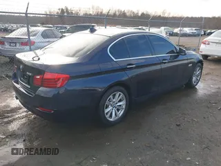 2015 BMW 5 Series 528i xDrive with VIN WBA5A7C5XFD624325, listed as a IAAI auction lot 41528322 with 111,054 mi miles and . Bid and sale history available at carsss.com. Image 4.