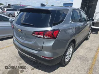 2023 Chevrolet Equinox LT z VIN 3GNAXJEG0PL125824, wystawiony jako IAAI lot #42239896 z przebiegiem 20 878 mil mil oraz . Historia ofert i sprzedaży dostępna na DreamBid. Obrazek 1.
