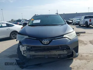 2017 Toyota RAV4 LE with VIN JTMZFREV4HJ113745, listed as a IAAI auction lot 41582326 with 186,394 mi miles and . Bid and sale history available at DreamBid. Image 12.