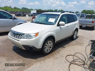 2012 Subaru Forester X Premium with VIN JF2SHADC9CH459997, listed as a IAAI auction lot 42588978 with 112,747 mi miles and . Bid and sale history available at DreamBid. Image 2.