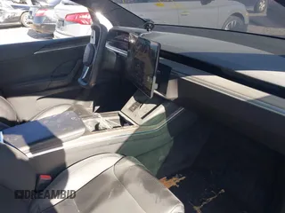 2023 Tesla Model X with VIN 7SAXCAE59PF377408, listed as a IAAI auction lot 41176738 with 32,496 mi miles and . Bid and sale history available at DreamBid. Image 5.