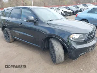 2015 Dodge Durango R/T with VIN 1C4SDJCT3FC156310, listed as a IAAI auction lot 42061041 with 99,621 mi miles and . Bid and sale history available at carsss.com. Image 1.