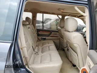 2003 Lexus LX 470 z VIN JTJHT00W033530306, wystawiony jako Copart lot #57162675 z przebiegiem 185 458 mil mil oraz Szkody całkowita. Historia ofert i sprzedaży dostępna na DreamBid. Obrazek 11.