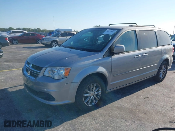 2015 Dodge Grand Caravan SXT with VIN 2C4RDGCG3FR592098, listed as a IAAI auction lot 42038665 with 104,092 mi miles and . Bid and sale history available at DreamBid. Image 2.
