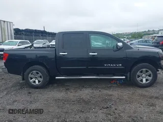 2011 Nissan Titan Pro-4X with VIN 1N6BA0ECXBN319157, listed as a IAAI auction lot 42456725 with 169,434 mi miles and . Bid and sale history available at DreamBid. Image 13.