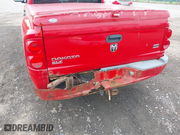 2007 Dodge Dakota SLT with VIN 1D7HW48N17S128373, listed as a IAAI auction lot 42633897 with 129,780 mi miles and . Bid and sale history available at DreamBid. Image 6.