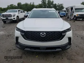 2025 Mazda CX-50 S Premium z VIN 7MMVABDM9SN331032, wystawiony jako Copart lot #60797015 z przebiegiem 9 572 mil mil oraz Nie do naprawy • Non repairable. Historia ofert i sprzedaży dostępna na DreamBid. Obrazek 5.