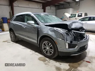 2023 Cadillac XT5 AWD Premium Luxury with VIN 1GYKNDRS5PZ221261, listed as a Copart auction lot 52779565 with 7,098 mi miles and Salvage Title. Bid and sale history available at DreamBid. Image 4.