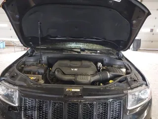 2015 Jeep Grand Cherokee Limited with VIN 1C4RJFBG4FC611156, listed as a IAAI auction lot 42021705 with 137,887 mi miles. Bid and sale history available at carsss.com. Image 10.