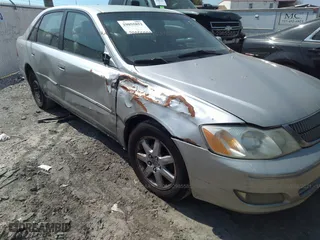 2001 Toyota Avalon XL w/Bucket Seats with VIN 4T1BF28B71U162206, listed as a IAAI auction lot 41673437 with 363,472 mi miles. Bid and sale history available at carsss.com. Image 6.