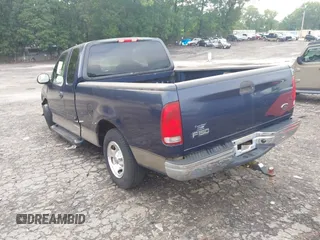 2002 Ford F-150 XL with VIN 1FTRX17202NA66022, listed as a IAAI auction lot 42382320 with 87,916 mi miles and . Bid and sale history available at DreamBid. Image 3.