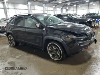 2019 Jeep Cherokee Trailhawk Elite with VIN 1C4PJMBX9KD461643, listed as a Copart auction lot 46308055 with 84,009 mi miles and Salvage Title. Bid and sale history available at carsss.com. Image 4.