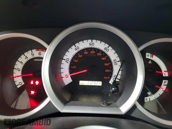 2014 Toyota Tacoma with VIN 5TFLU4ENXEX089927, listed as a Copart auction lot 52140565 with 112,924 mi miles and Salvage Title. Bid and sale history available at DreamBid. Image 9.