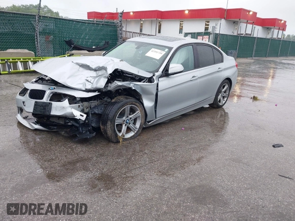 2013 BMW 3 Series 328i xDrive with VIN WBA3B5G56DNS05222, listed as a IAAI auction lot 42351739 with 98,399 mi miles and . Bid and sale history available at DreamBid. Image 2.