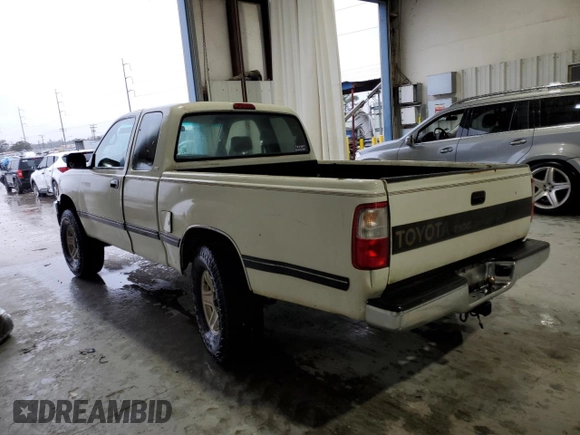 1997 Toyota T100 SR5 with VIN JT4UN24D9V0048079, listed as a Copart auction lot 87042344 with 303,785 mi miles and Salvage Title. Bid and sale history available at DreamBid. Image 2.