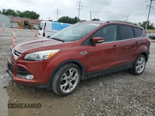 2015 Ford Escape Titanium with VIN 1FMCU0JX4FUA90098, listed as a Copart auction lot 59933775 with 112,310 mi miles and Salvage title. Bid and sale history available at DreamBid. Image 1.