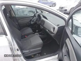 2015 Toyota Yaris L with VIN VNKKTUD32FA017551, listed as a IAAI auction lot 41267892 with 122,506 mi miles. Bid and sale history available at carsss.com. Image 5.