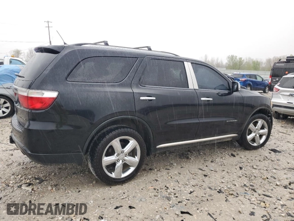 2013 Dodge Durango Citadel with VIN 1C4SDJET0DC616002, listed as a Copart auction lot 54677325 with 174,131 mi miles and Salvage title. Bid and sale history available at DreamBid. Image 3.