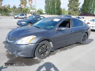 2012 Nissan Altima SR with VIN 1N4BL2AP5CN470612, listed as a IAAI auction lot 42218813 with 153,997 mi miles and . Bid and sale history available at DreamBid. Image 2.