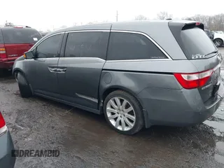 2012 Honda Odyssey Touring with VIN 5FNRL5H98CB089871, listed as a IAAI auction lot 41351447 with 999,999 mi miles. Bid and sale history available at carsss.com. Image 13.