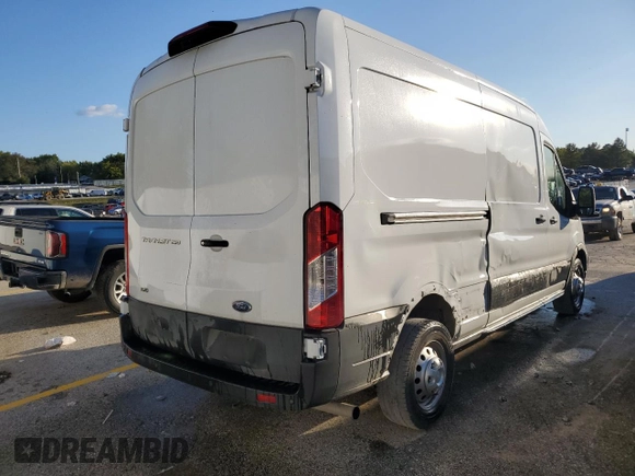 2023 Ford Transit Cargo z VIN 1FTBR2C8XPKC00992, wystawiony jako Copart lot #73199944 z przebiegiem 31 891 mil mil oraz Czysty tytuł • Clean title. Historia ofert i sprzedaży dostępna na DreamBid. Obrazek 3.