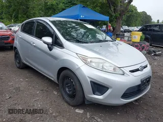 2013 Ford Fiesta SE z VIN 3FADP4EJ4DM223771, wystawiony jako IAAI lot #42457730 z przebiegiem 161 220 mil mil oraz . Historia ofert i sprzedaży dostępna na DreamBid. Obrazek 1.