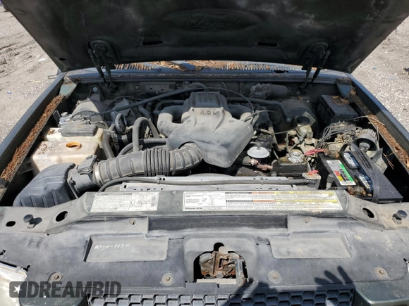 2001 Ford Explorer Sport z VIN 1FMYU60E31UA70006, wystawiony jako Copart lot #56430155 z przebiegiem 194 924 mil mil oraz Czysty tytuł • Clean title. Historia ofert i sprzedaży dostępna na DreamBid. Obrazek 11.