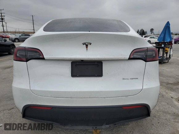 2023 Tesla Model Y Long Range z VIN 7SAYGDEE9PA070232, wystawiony jako Copart lot #55881805 z przebiegiem 38 276 mil mil oraz Szkoda całkowita • Salvage title. Historia ofert i sprzedaży dostępna na DreamBid. Obrazek 6.