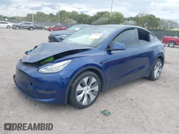 2022 Tesla Model Y Long Range z VIN 7SAYGDEE9NA002493, wystawiony jako IAAI lot #41756460 z przebiegiem 68 315 mil mil oraz . Historia ofert i sprzedaży dostępna na DreamBid. Obrazek 2.