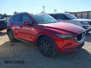 2018 Mazda CX-5 Grand Touring with VIN JM3KFADM3J0380826, listed as a IAAI auction lot 41888097 with 70,529 mi miles. Bid and sale history available at carsss.com. Image 1.