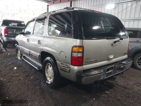 2001 GMC Yukon SLT with VIN 1GKEC13T91J202831, listed as a IAAI auction lot 41196576 with 252,478 mi miles. Bid and sale history available at carsss.com. Image 3.