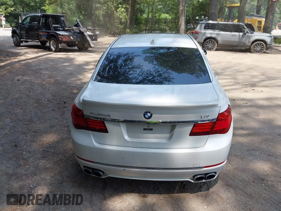 2013 BMW 7 Series 750Li with VIN WBAYE8C55DDS16013, listed as a IAAI auction lot 42709519 with 123,405 mi miles and . Bid and sale history available at DreamBid. Image 16.