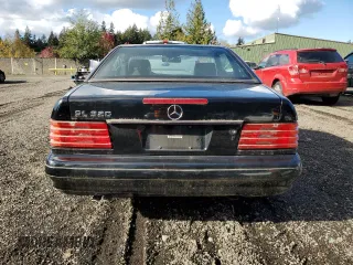 1997 Mercedes-Benz SL-Class with VIN WDBFA63F7VF145758, listed as a Copart auction lot 77503244 with 132,664 mi miles and Clean Title. Bid and sale history available at carsss.com. Image 6.