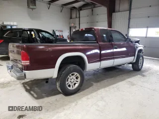 2001 Dodge Dakota Sport z VIN 1B7GG22NX1S172265, wystawiony jako Copart lot #42190165 z przebiegiem 109 799 mil mil oraz Szkoda całkowita • Salvage title. Historia ofert i sprzedaży dostępna na DreamBid. Obrazek 3.