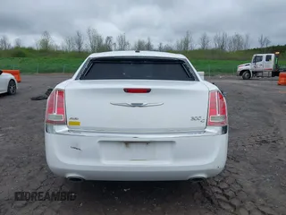 2014 Chrysler 300 C with VIN 2C3CCAKG5EH200996, listed as a IAAI auction lot 42201747 with 156,121 mi miles and . Bid and sale history available at carsss.com. Image 16.