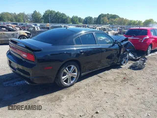 2013 Dodge Charger RT Plus with VIN 2C3CDXDT6DH567009, listed as a IAAI auction lot 40619931 with 145,015 mi miles. Bid and sale history available at carsss.com. Image 4.