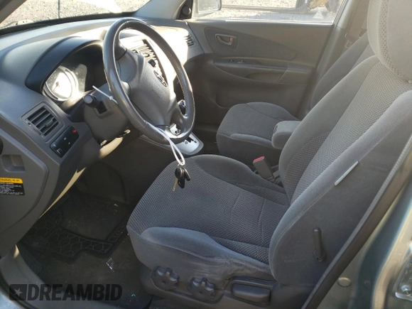 2006 Hyundai Tucson GLS with VIN KM8JN12D16U426014, listed as a Copart auction lot 71228334 with 125,817 mi miles and Clean Title. Bid and sale history available at carsss.com. Image 7.