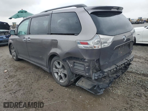 2014 Toyota Sienna SE with VIN 5TDXK3DC3ES470042, listed as a Copart auction lot 49254335 with 99,208 mi miles and Salvage Title. Bid and sale history available at DreamBid. Image 2.