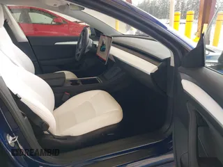 2022 Tesla Model 3 Long Range with VIN 5YJ3E1EB3NF267365, listed as a IAAI auction lot 41996594 with 32,687 mi miles and . Bid and sale history available at DreamBid. Image 5.