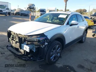 2023 Mazda CX-30 2.5 S Premium Package with VIN 3MVDMBDM4PM520769, listed as a IAAI auction lot 41371190 with 15,626 mi miles. Bid and sale history available at carsss.com. Image 18.