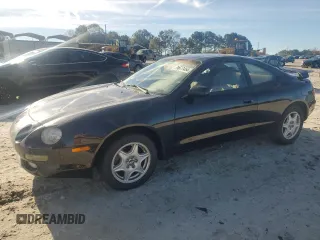 1997 Toyota Celica GT with VIN JT2DG02TXV0040610, listed as a Copart auction lot 79677454 with 179,749 mi miles and Salvage Title. Bid and sale history available at carsss.com. Image 1.