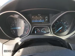 2014 Ford Focus Titanium with VIN 1FADP3J26EL132223, listed as a Copart auction lot 71490004 with 131,233 mi miles and Salvage Title. Bid and sale history available at DreamBid. Image 9.