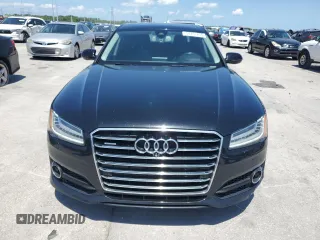 2018 Audi A8 z VIN WAU44AFD0JN000880, wystawiony jako Copart lot #54751235 z przebiegiem 76 161 mil mil oraz Szkody całkowita. Historia ofert i sprzedaży dostępna na DreamBid. Obrazek 5.